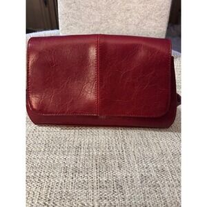 Liz Claiborne small red faux leather shoulder bag.